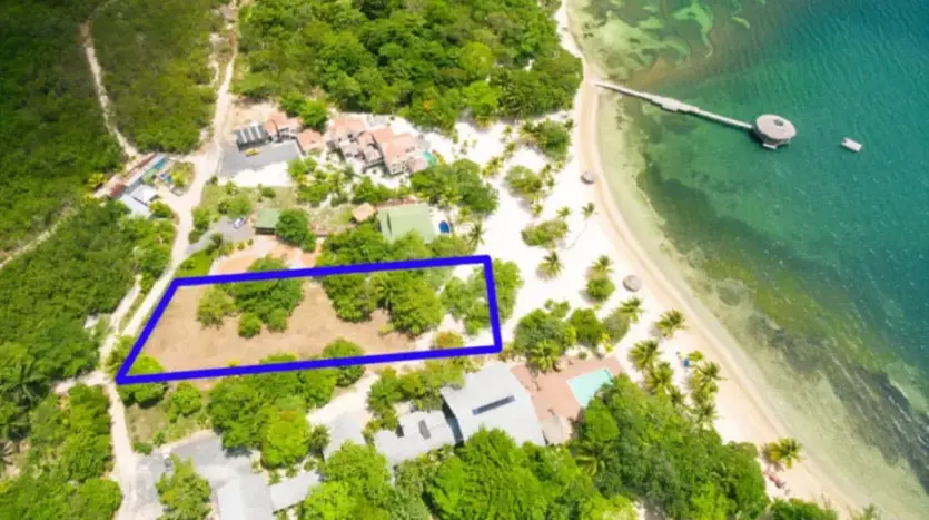 Aerial view of the beachfront homesite outlined in Palmetto Bay, Roatan