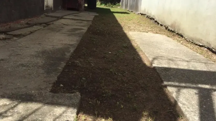 Side passage of the house in Colonia Bella Vista, Puerto Cortes