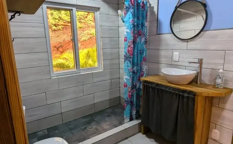 Bathroom with vessel sink at Flamingo House, Roatan
