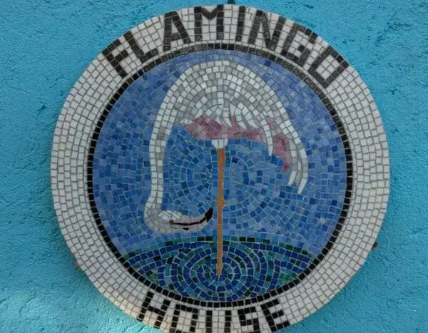Flamingo House mosaic sign in First Bight, Roatan