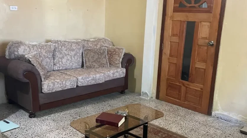 Living room with sofa in an apartment in Puerto Cortes