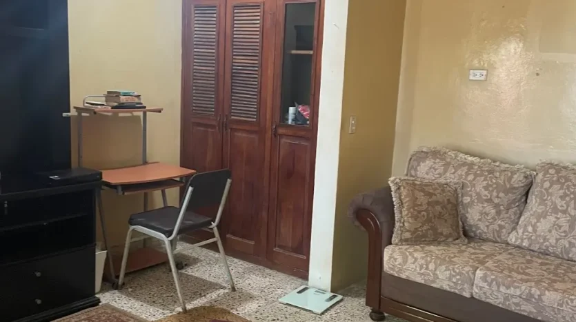 Living room and wardrobe in an apartment in Puerto Cortes