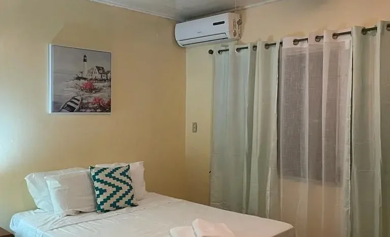 Bedroom with air conditioning in an apartment in Puerto Cortes