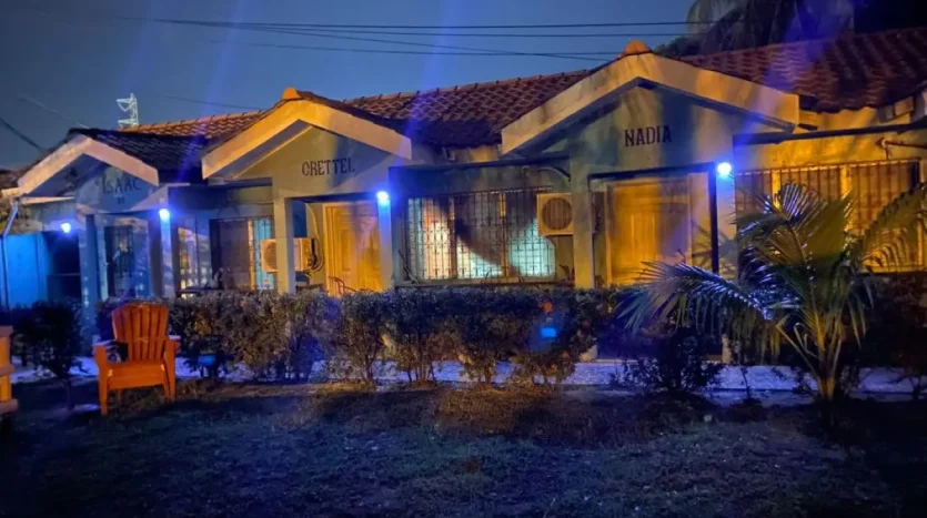 Apartments with office space lit at night in Puerto Cortes