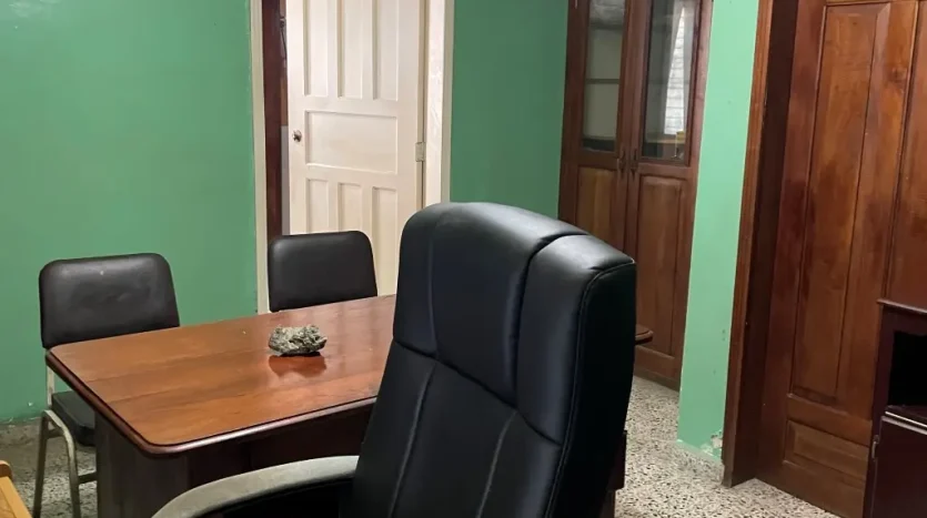 Office with leather chair in the building in Puerto Cortes