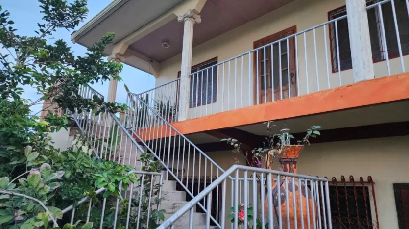 Stairs and upper balcony of the 6 bedroom home in Tela