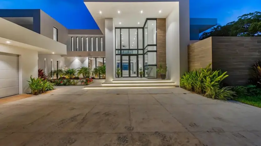 Villa entrance lit in the evening