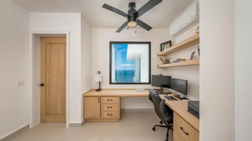 Home office with built-in shelves