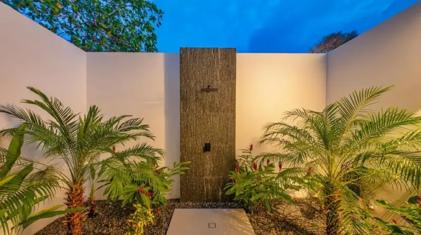 Outdoor shower in a tropical garden
