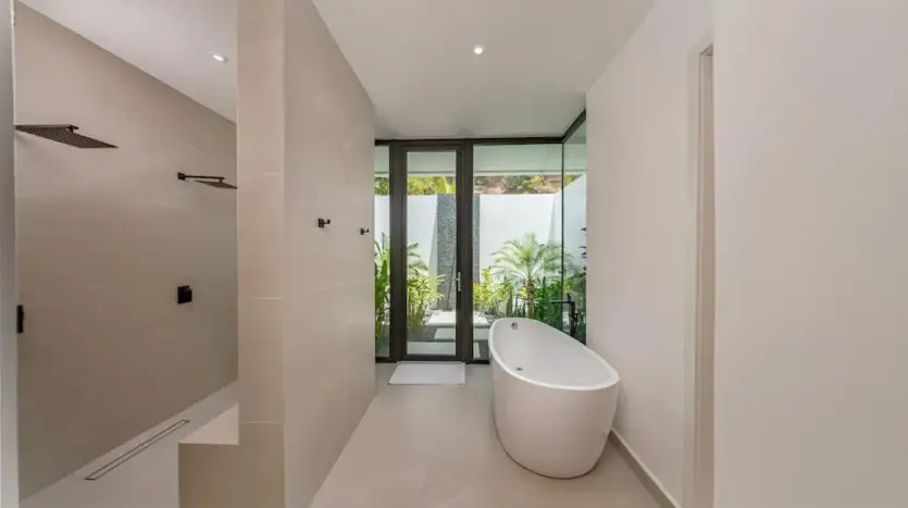 Bathroom with freestanding soaking tub