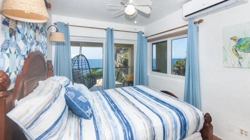 Upstairs guest bedroom with balcony