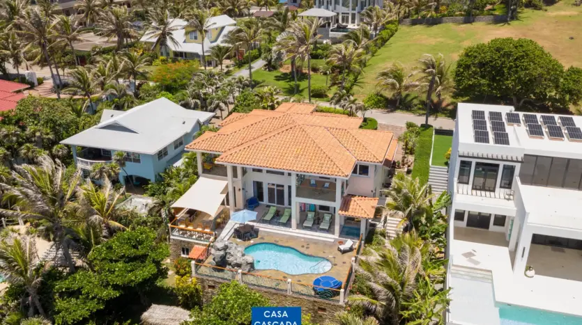 Home, pool and tropical garden from above