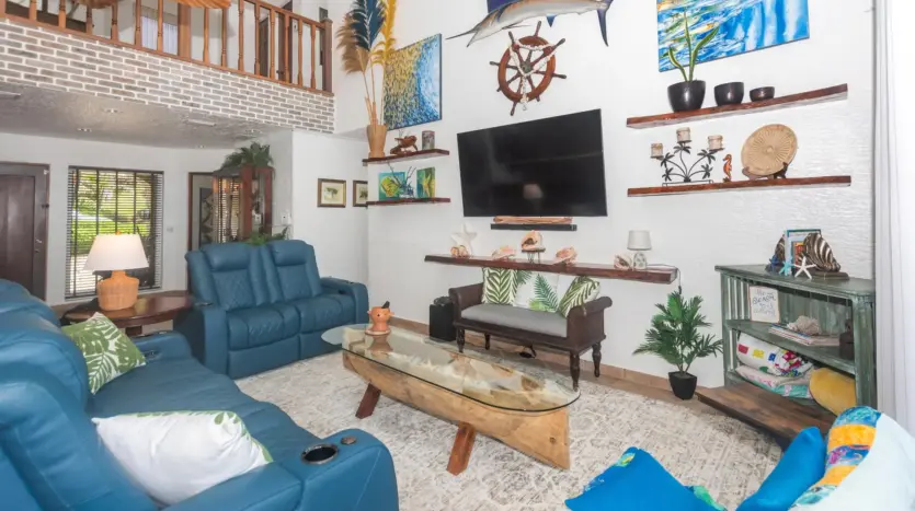Living room with blue leather sofas