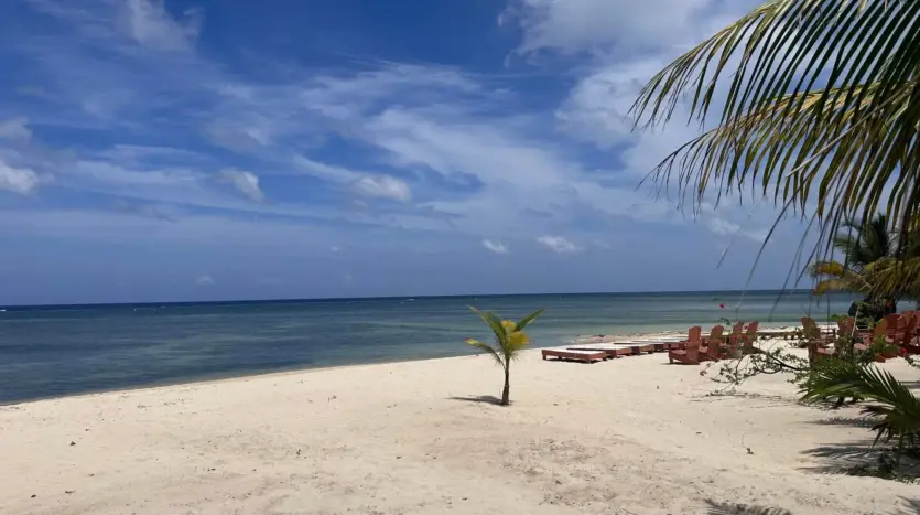 Sandy Bay beach with calm Caribbean water