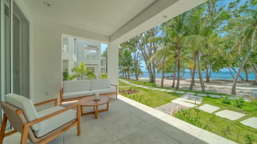Covered ground-floor terrace facing the gardens