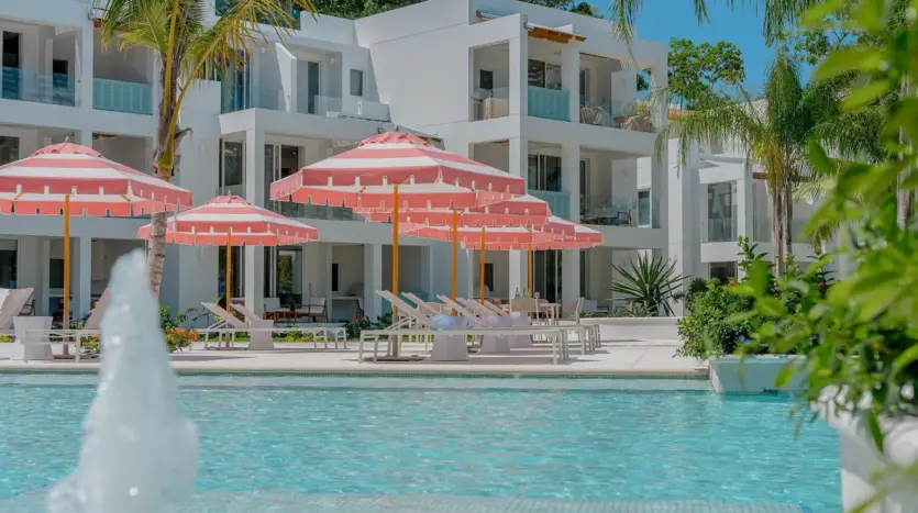 Pool fountain and umbrellas